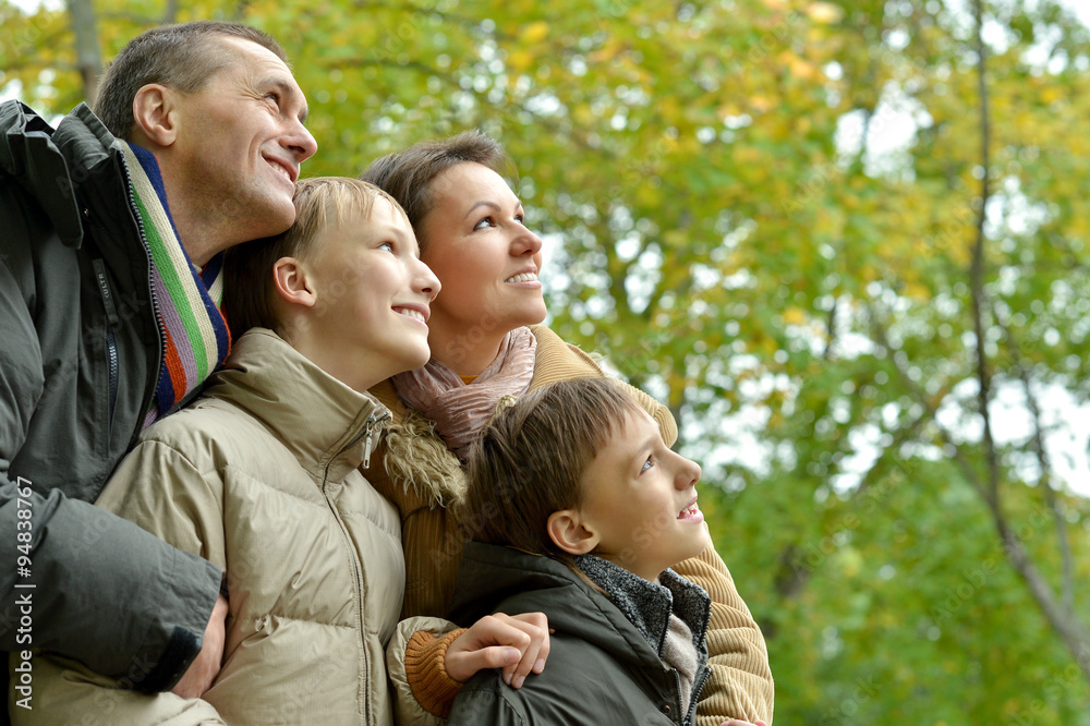 Family relaxing in autumn park Family relaxing in autumn park
