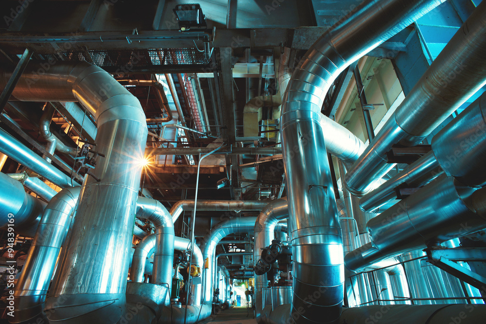 Equipment, cables and piping as found inside of a modern industr Equipment, cables and piping as found inside of a modern industr