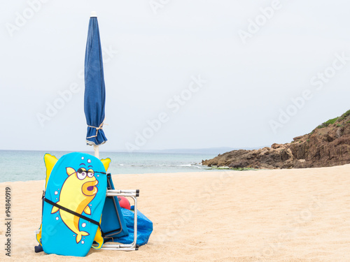 closed parasols on the beach