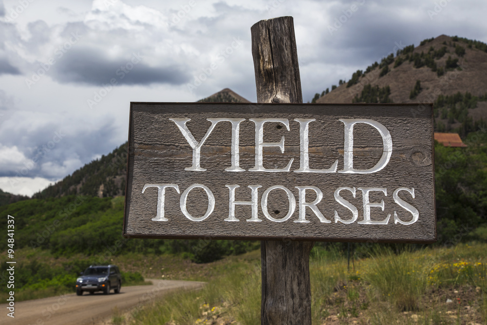 Road sign saying Yield to Horses, Colorado, USA, 04.07.2014