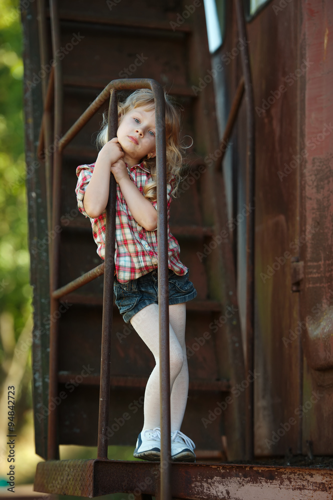 Naklejka premium little beautiful girl with long hair