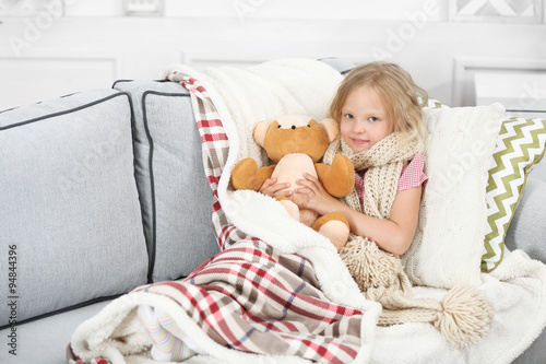 Little girl with sore throa...