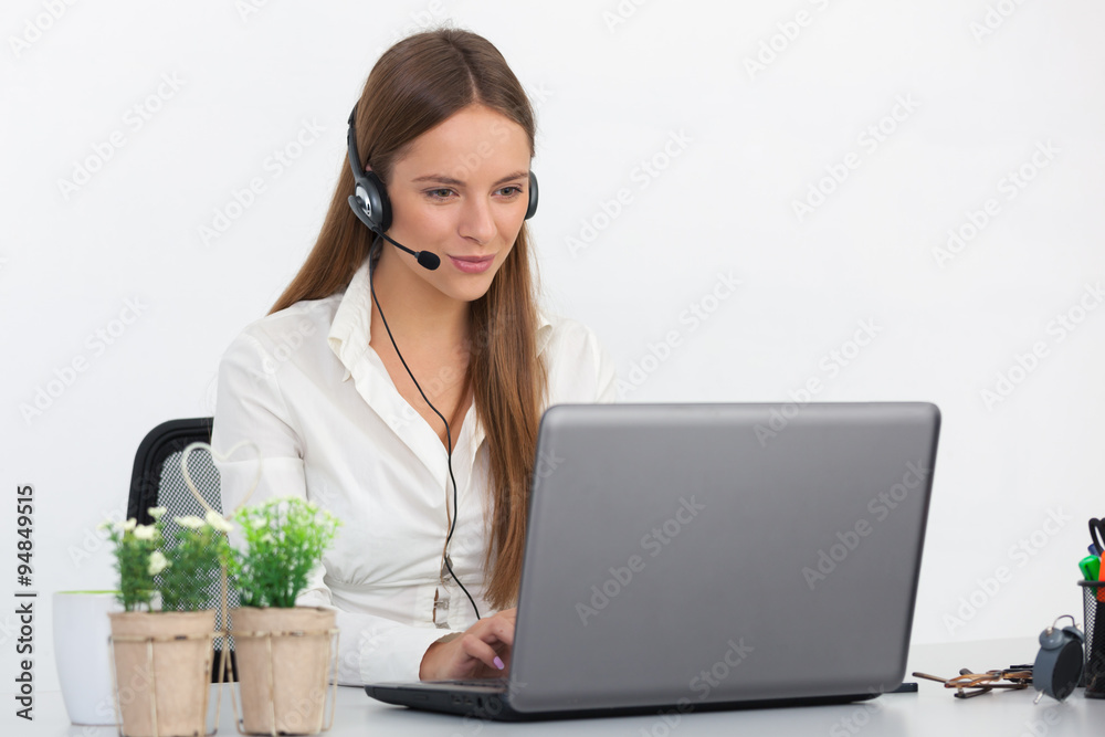 Portrait of happy young support phone operator with headset. Portrait of happy young support phone operator with headset.