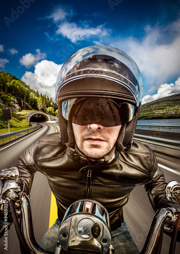 Biker racing on the road