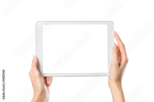 Hands holding digital tablet