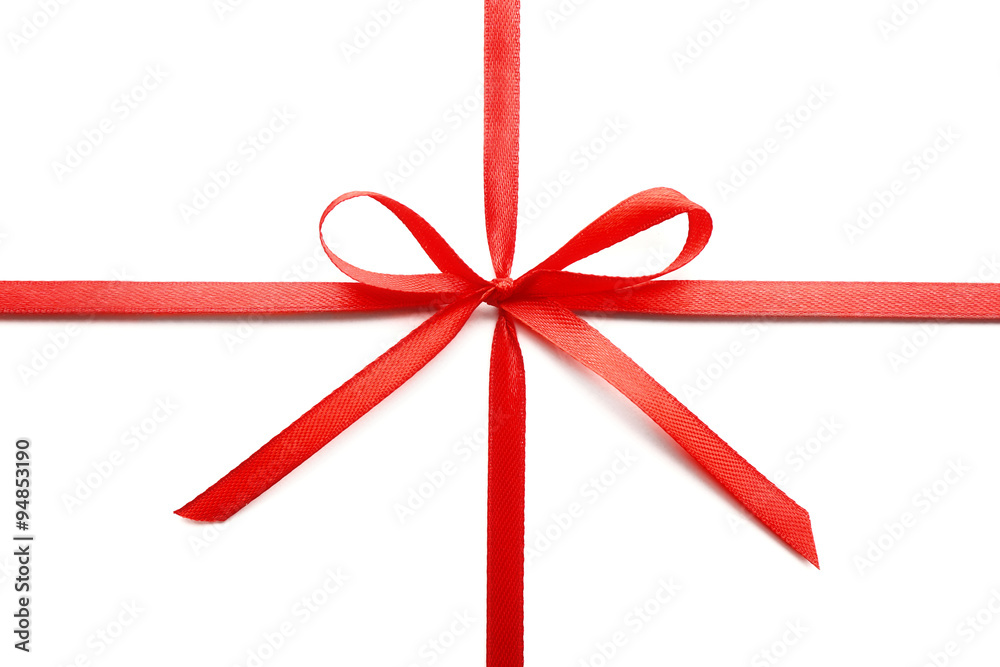 Shiny red ribbon with bow isolated on white Shiny red ribbon with bow isolated on white
