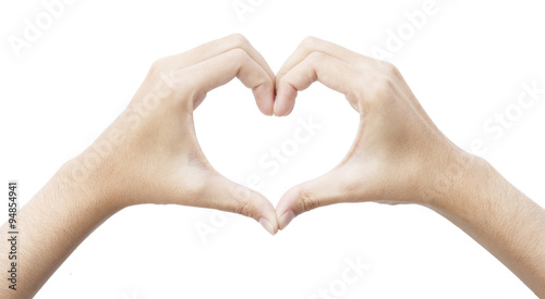  Female hands shaping form like a heart symbol on isolate. Conce