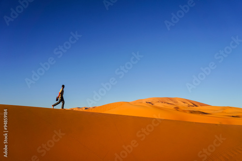 Lonely boy in desert