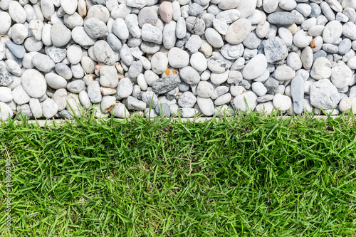 pebble stone and green grass