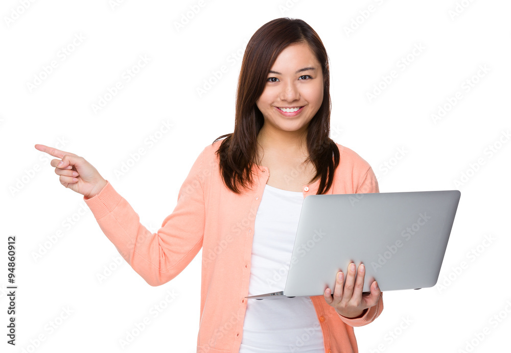 Asian Young Woman hold with laptop computer and finger point up Asian Young Woman hold with laptop computer and finger point up