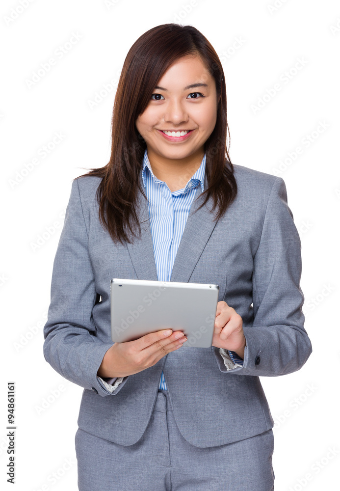 Businesswoman use of the digital tablet pc Businesswoman use of the digital tablet pc