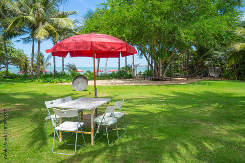 Bench with table on beach