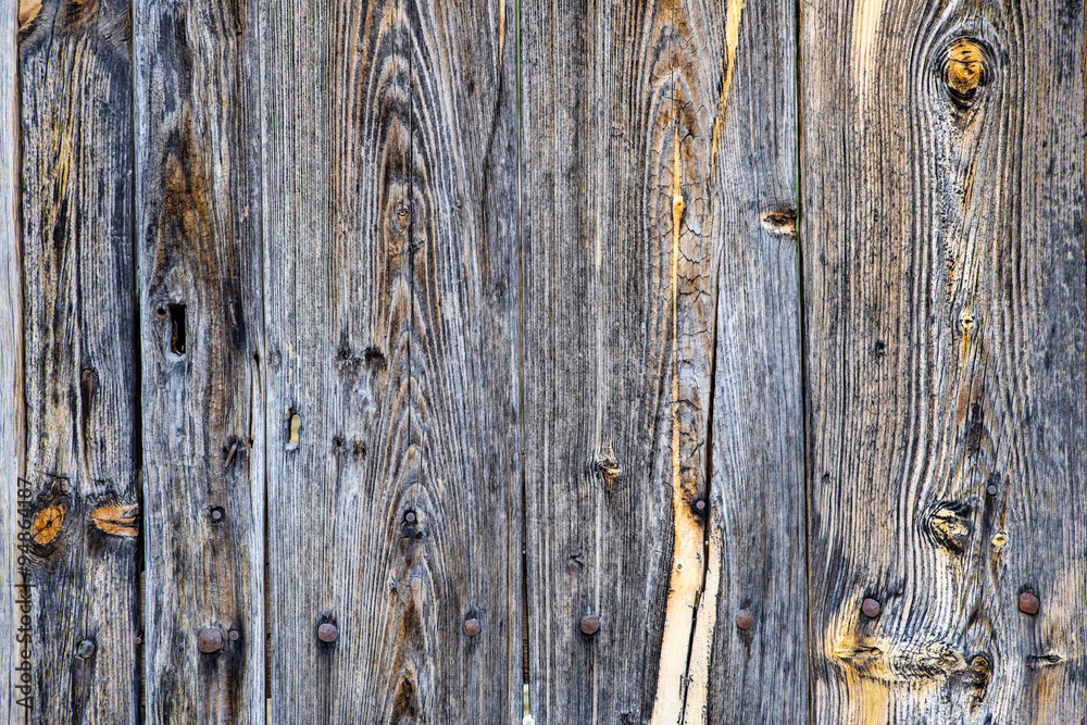 Rural rough grey wood texture background with rivets. Rural rough grey wood texture background with rivets.