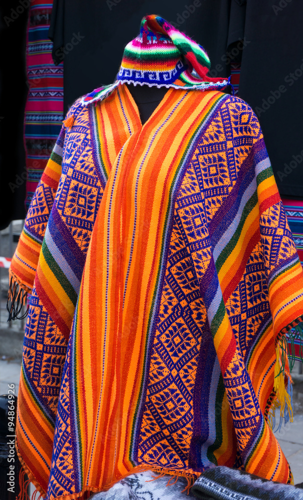 South American colourful poncho and hat. patterns an Stock | Adobe Stock