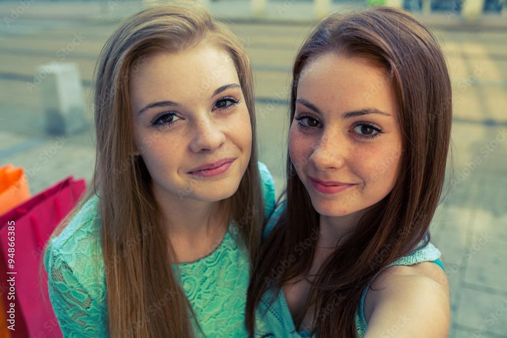 Two pretty girls. They're best friends. Outdoor photo. Stock Photo