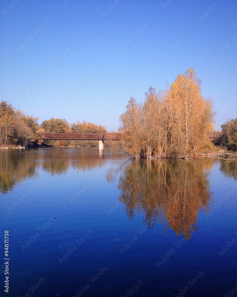 Oleggio bridge - autumn colors on the river