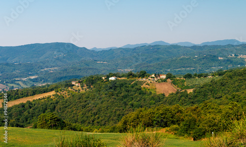Fototapeta Naklejka Na Ścianę i Meble -   Tuscany, farmhouse in the  countryside landscape, surrounded by  golden hills, Italy.