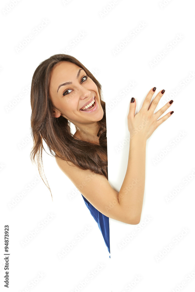 Young beautiful brunette woman holding a white blank paper on white background Young beautiful brunette woman holding a white blank paper on white background