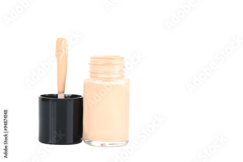 Liquid foundation in the bottle isolated on a white