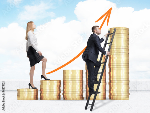 A woman in formal clothes is going up through a stairs which are made of golden coins, while a man has found a shortcut how to reach the final point. A concept of success. Cloudy sky background. photo