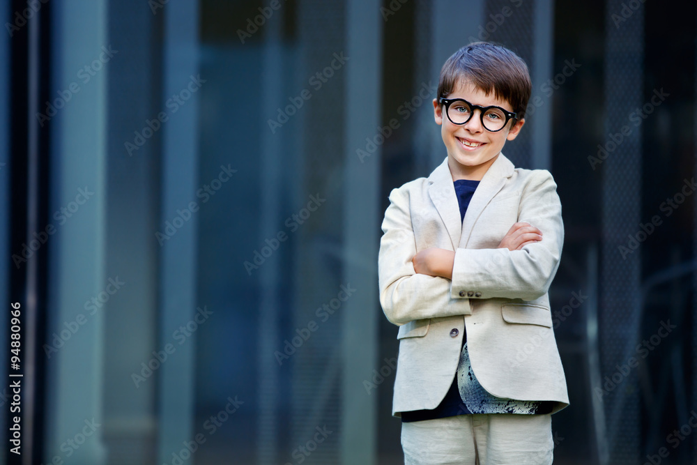 Little boy in a nice suit and glasses. Back to school Little boy in a nice suit and glasses. Back to school