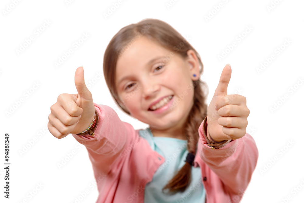 happy, smiling young little girl giving thumb up gesture happy, smiling young little girl giving thumb up gesture