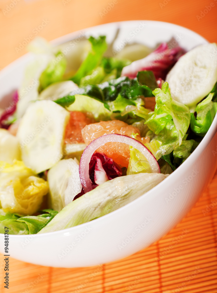 Salad with lettuce, cucumbers and grapefruit Salad with lettuce, cucumbers and grapefruit