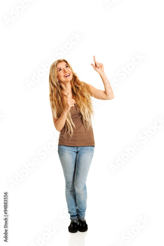 Student woman pointing up