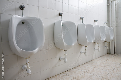Pattern of white urinals for men in Majorca, Spain, Europe