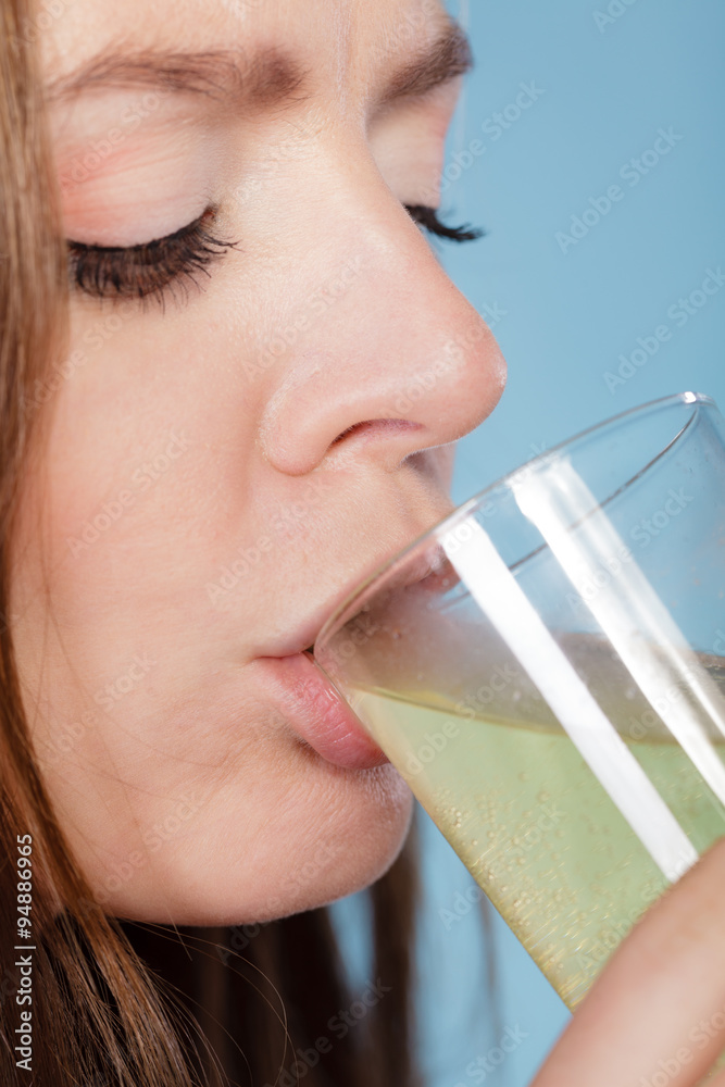 Woman drink pill dissolved in water. Health care. Woman drink pill dissolved in water. Health care.