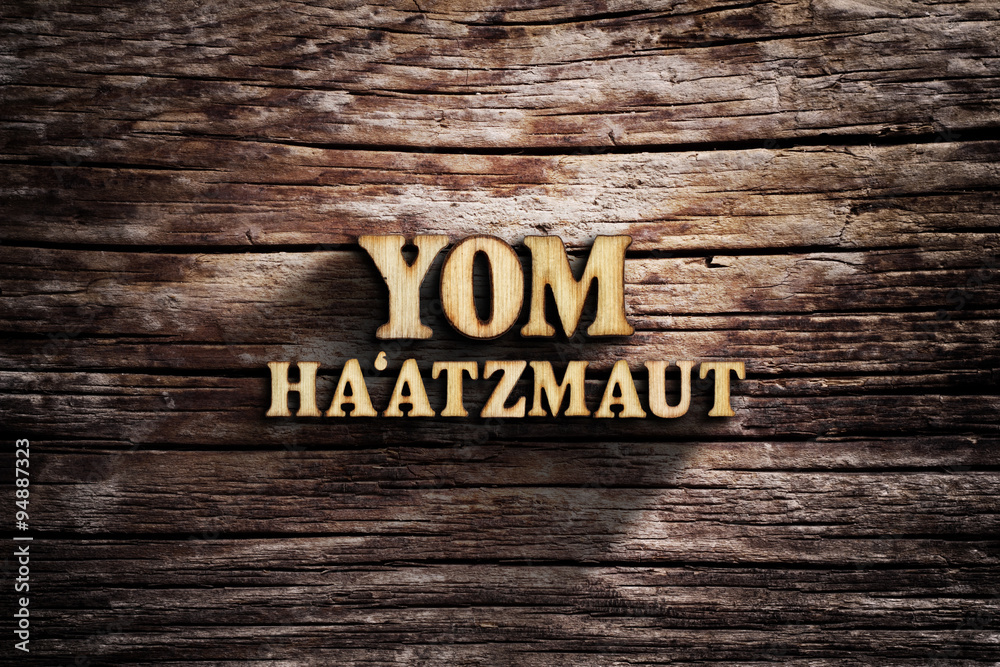 Fototapeta premium Yom Ha'atzmaut. Words on old wooden board.