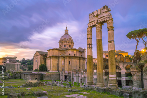 Roman Forum at dawn, Rome, Italy, with brick Curia and church 