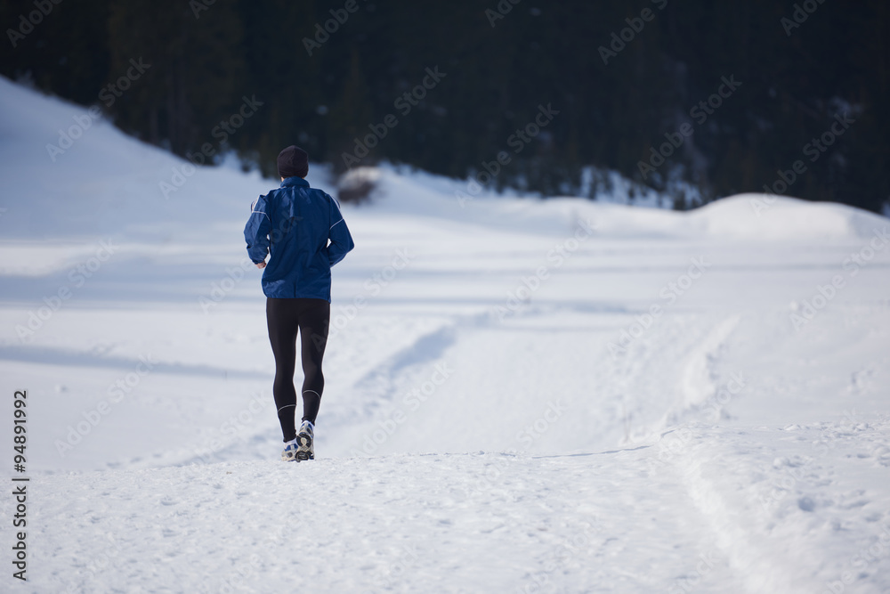 jogging on snow in forest