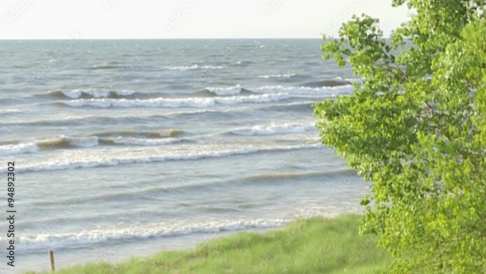 Summer sunset on the shores of Lake Michigan Summer sunset on the shores of Lake Michigan