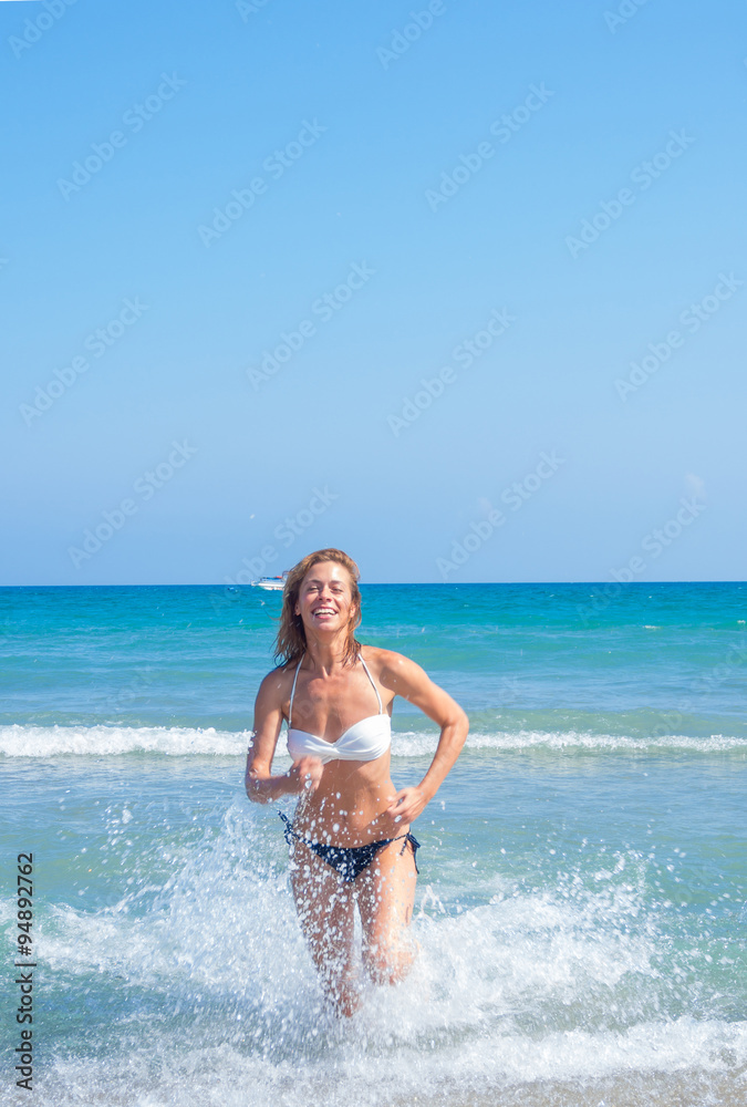 An attractive young woman at the beach