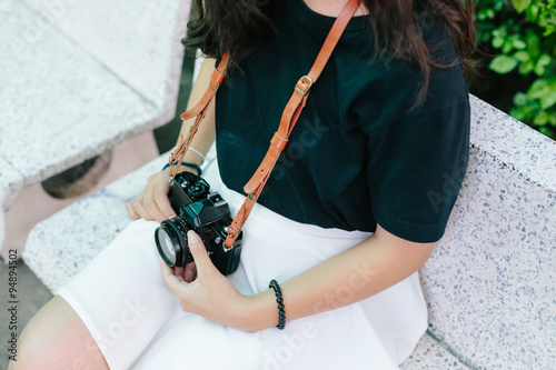 girl with vintage film camera