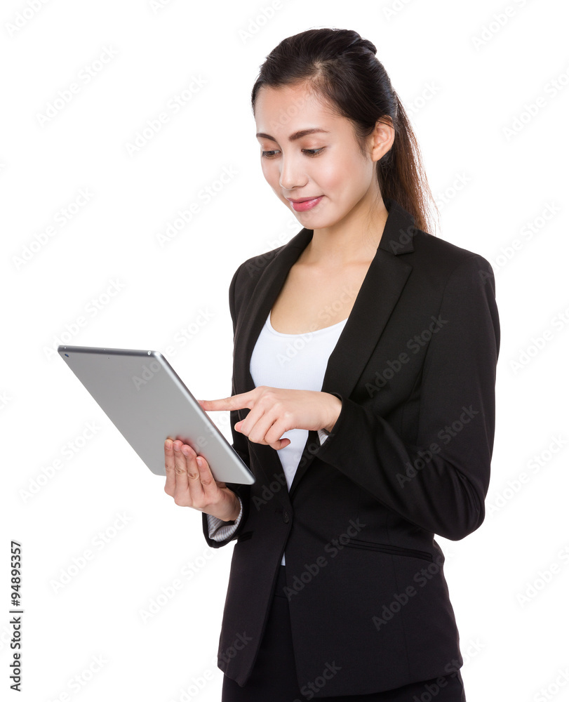 Businesswoman use of the tablet pc Businesswoman use of the tablet pc