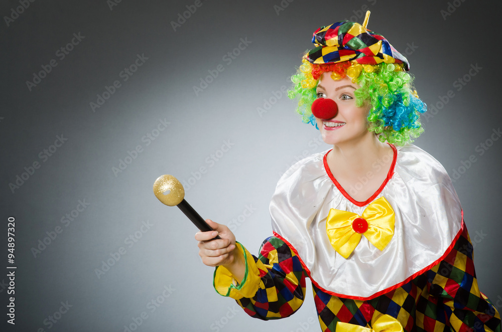 Clown with mic in funny concept Clown with mic in funny concept