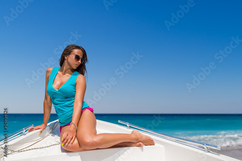 Beautiful girl on a speed boat