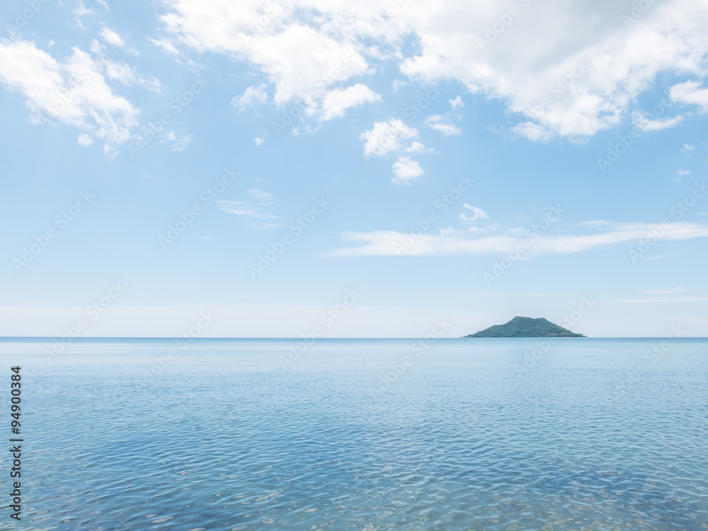 Island located on the middle of the Thai coast sea with blue sky