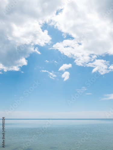 Seascape pastel tone with copy space and blue sky cloud vertical