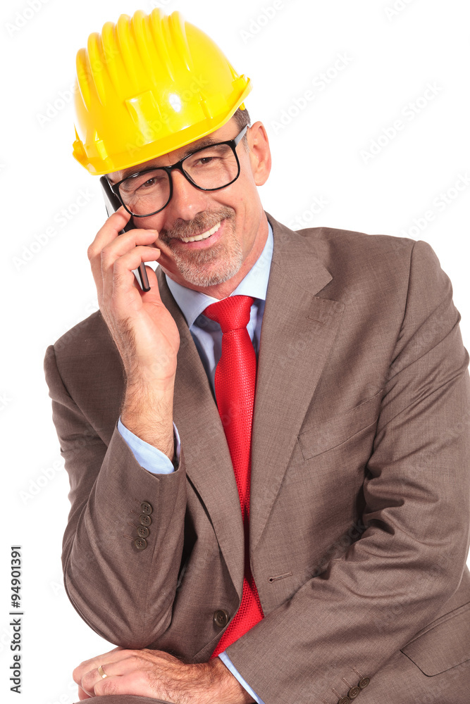 happy senior architect talking on the phone happy senior architect talking on the phone