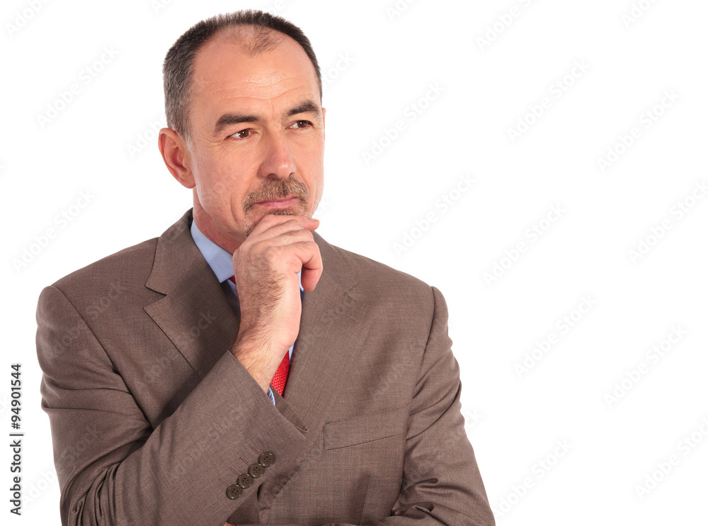 side view of a pensive old businessman looking away side view of a pensive old businessman looking away