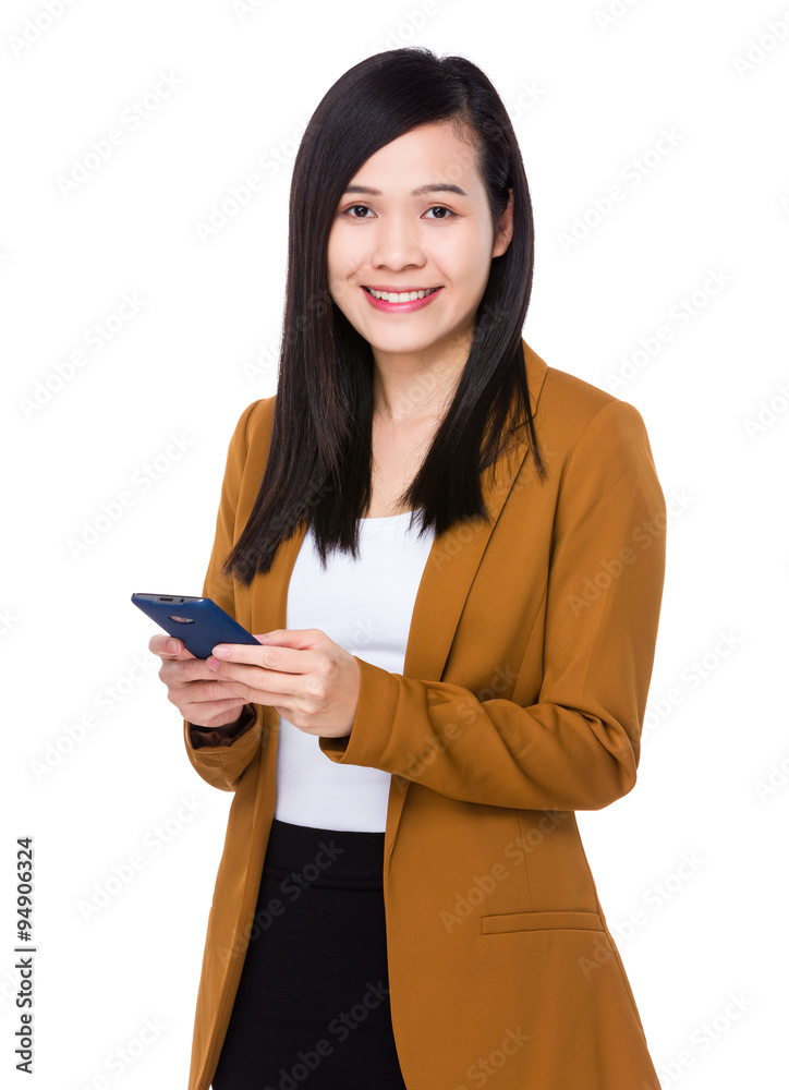 Businesswoman use of the cellphone Businesswoman use of the cellphone