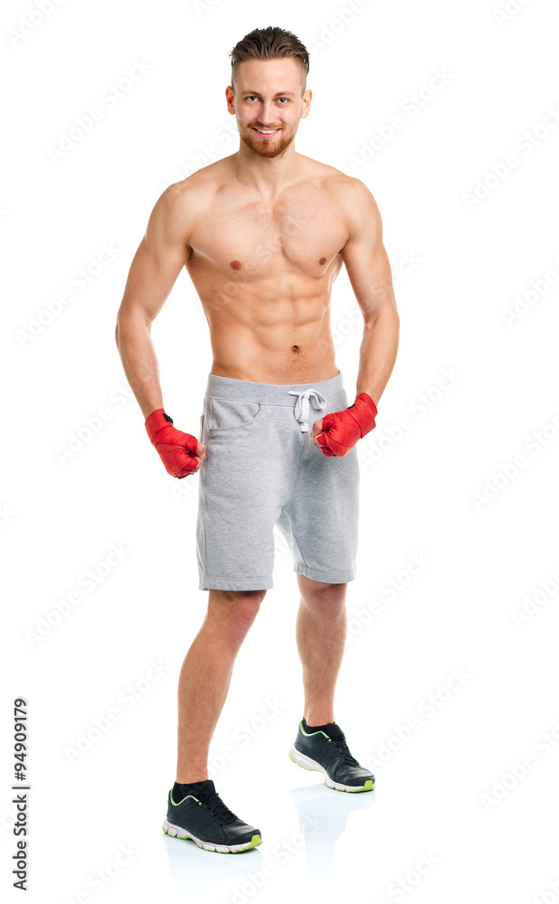 Athletic attractive man wearing boxing bandages on the white Athletic attractive man wearing boxing bandages on the white