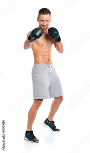 Sport attractive man wearing boxing gloves on the white