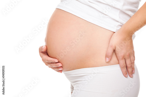 Pregnant woman with back pain © and.one