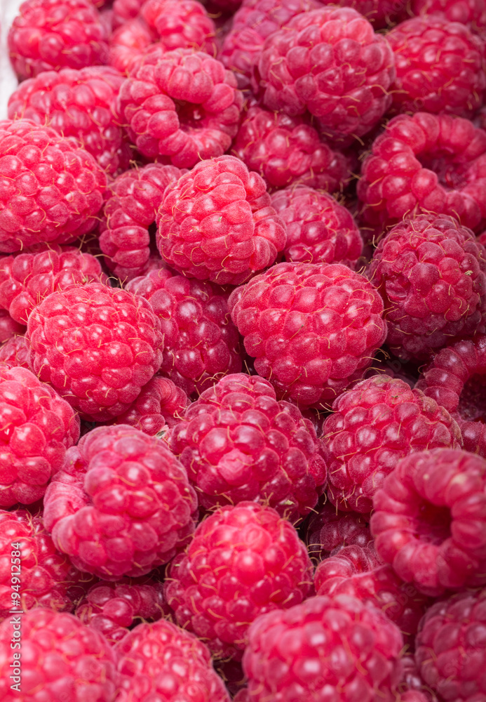 A beautiful selection of freshly picked ripe red raspberries. A beautiful selection of freshly picked ripe red raspberries.
