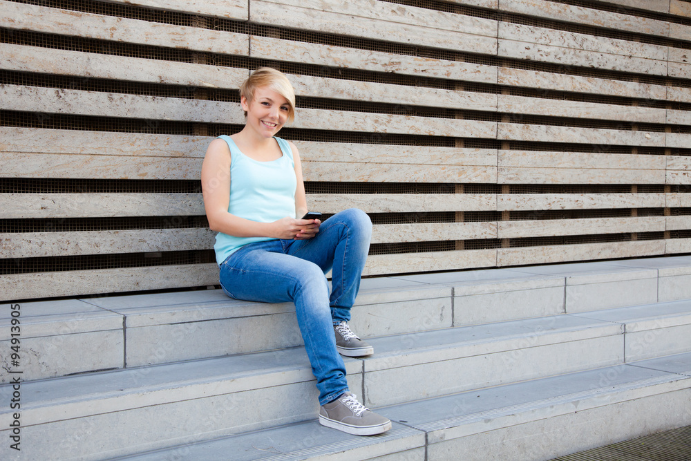 Attractive young woman using smart phone Attractive young woman using smart phone