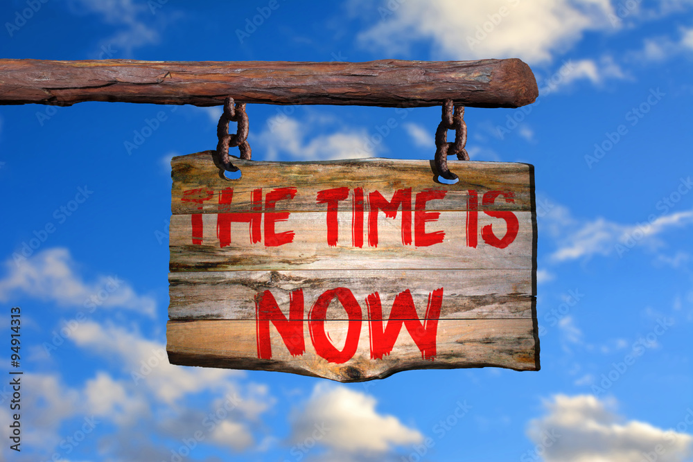 Fototapeta premium The time is now motivational phrase sign